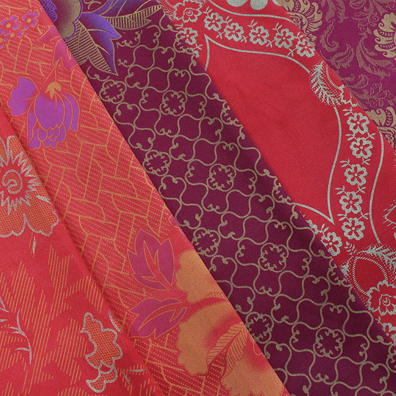 The factory directly supplies 100% polyester warp knitted printed mattress fabric, gold powder printed cloth
