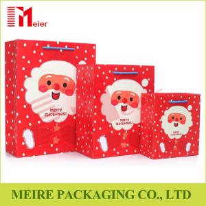 Wholesale Xmas Santa Claus printing gift bag festival christmas paper bag printed with thress size from china suppliers