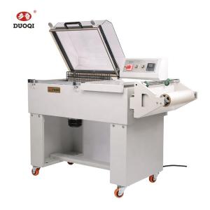 Wholesale DUOQI Electrical Film Shrink Packing Auto Sealing Cutting Heat Shrink Wrapping Machine from china suppliers