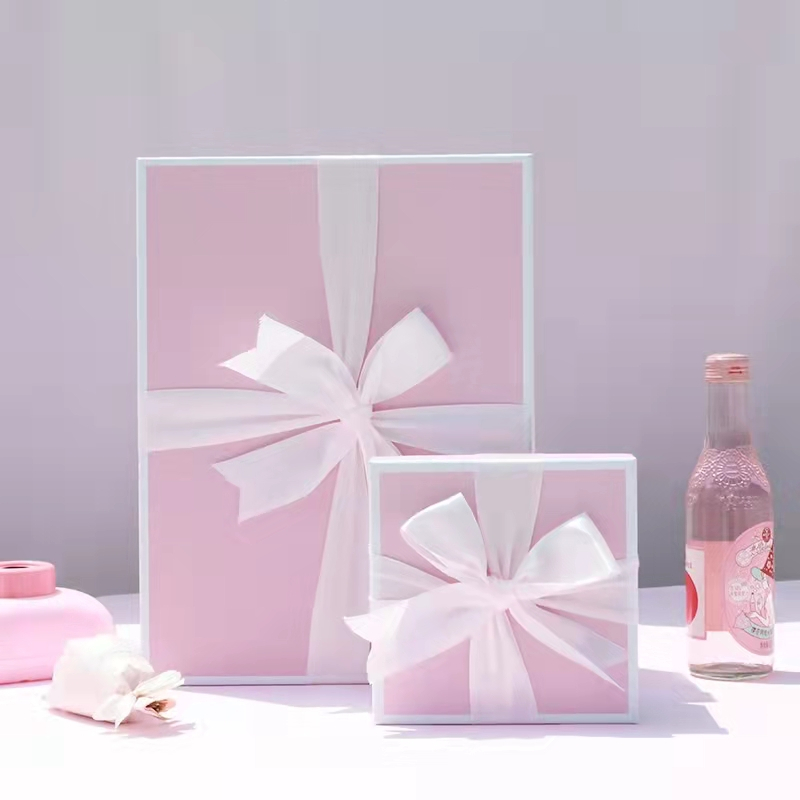 Spot Color Luxury Pink Rigid Cardboard Gift Box Handbags Cosmetic Gift Packaging Box with Ribbon
