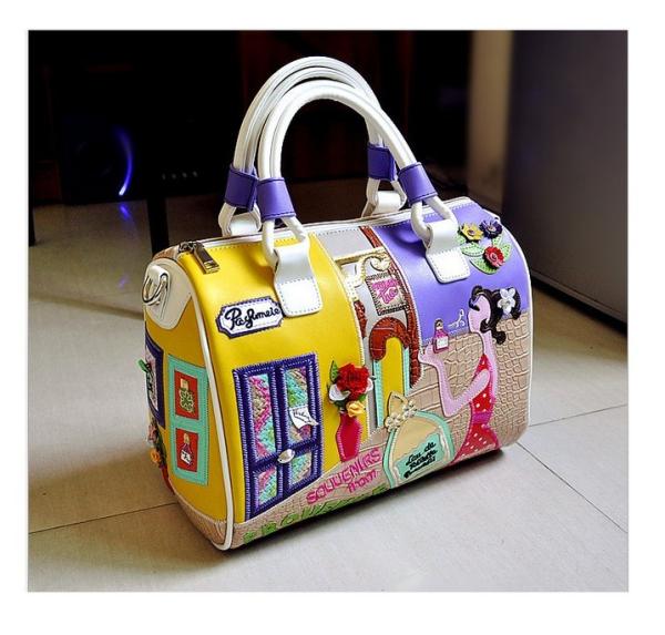 Europe and selling women's handbags shoulder diagonal cartoon character