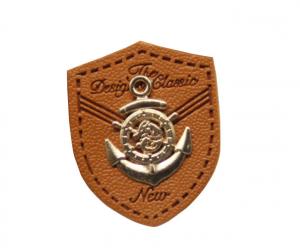 China custom leather labels for hats garment leather tags wholesale with metal logo on sale
