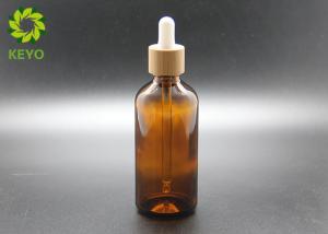 Wholesale Boston Round Amber Glass Lotion Bottles With Bamboo Dropper In 30ml 1 Oz from china suppliers
