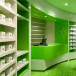 Fashionable Pharmacy Display Cabinet , Green Retail Pharmacy Shelving Multi