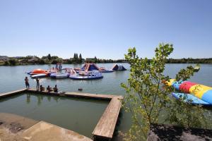Wholesale Resort Adventure Inflatable Waterpark Tremplins Water Jump - Lac - Arroques from china suppliers