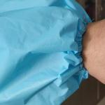 Disposable isolation gown