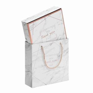 Wholesale Kuaima Rose Gold Boutique Embossed Printed Paper Gift Bags Marble Paper Boxes Custom from china suppliers