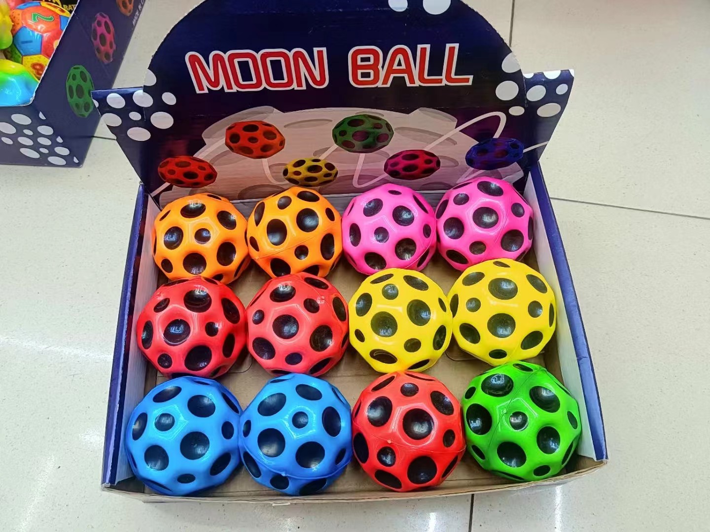 Kids' Favorite High Resilience Moon Shape Porous Bouncy Ball with Ergonomic Design