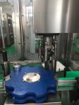 SUS 304 1500bph Beer Filling Machine Automatic Beer Bottle Filler ISO9001