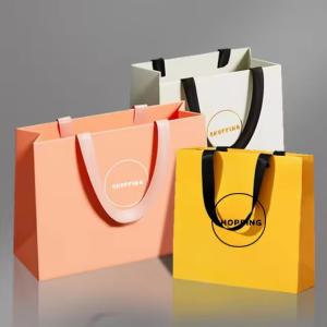 Wholesale Paper Bag Custom Printed Logo Luxury Clothing Shopping Paper Bags Boutique Recyclable Gift Bag With Ribbon Rope from china suppliers