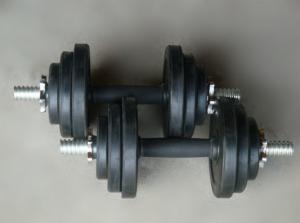 Wholesale hot sale cheap black Rubber coated round dumbbell set for gym from china suppliers