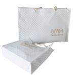 Bridal White Quilted NonWoven Fabric Small Square Veins Burning Letter Logo