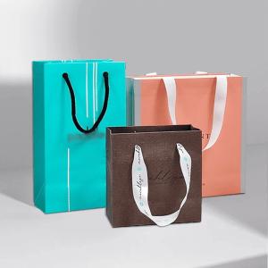 Wholesale Ribbon Accessories Custom Logo Paper Handbag for Retail Shopping Gift Packaging Bags from china suppliers