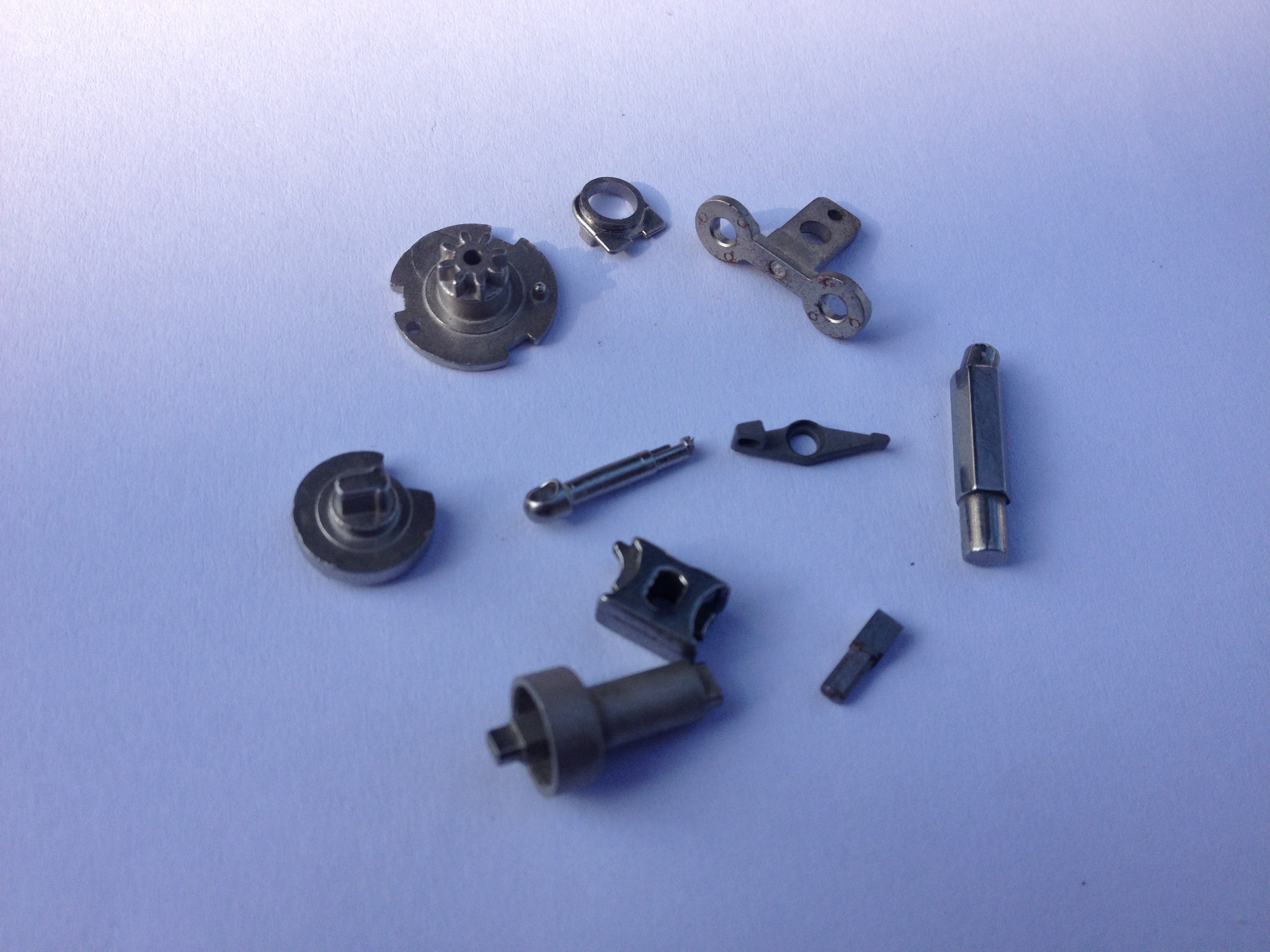 0.002mm Precision MIM Metal Injection Molding For Develop Design And Manufacture