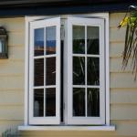 Windproof Double Hinged Glass Entry Doors PVC Impact Resistant ODM