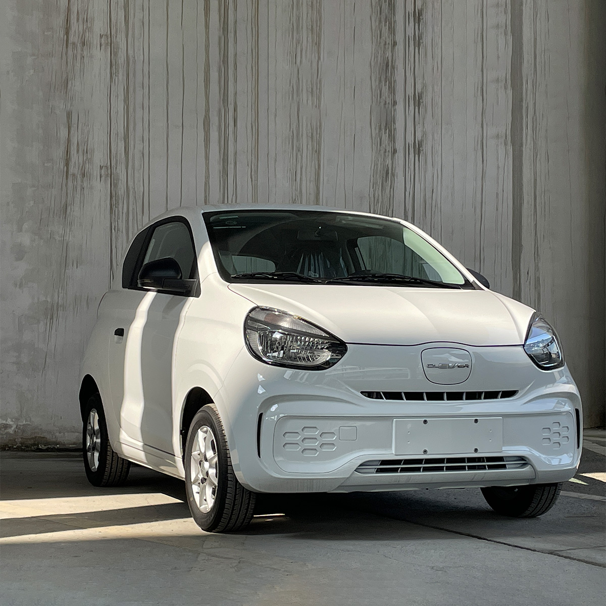 Front Suspension MacPhersan Type Independent Saic Roewe Clever Electric Mini Car for Adults 4 Seater Energy EV Vehicle