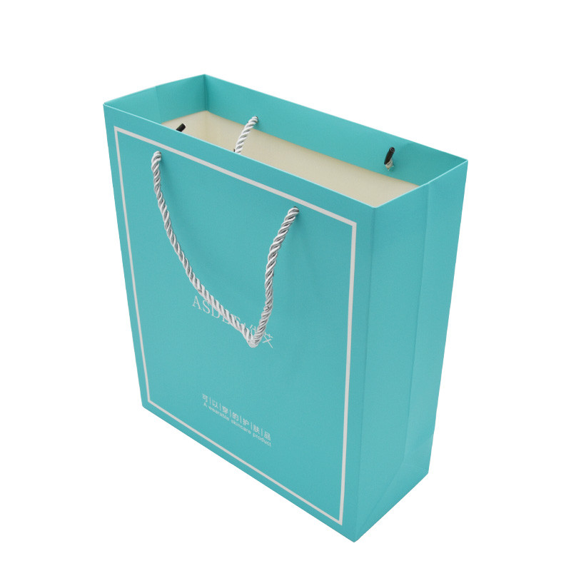 Gift Custom Paper Shopping Bags PP Rope Debossed Print Artpaper 157gram
