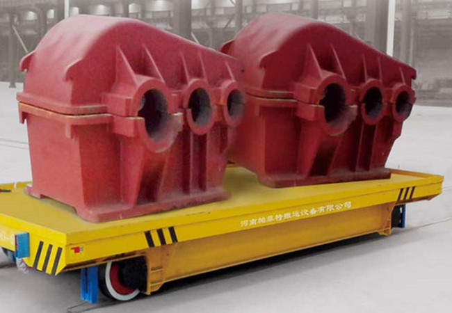 electric material handling flatbed cart on track