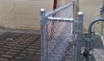 Chain wire fence protects and decorates garden and sports yard