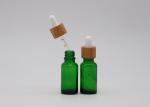 Green Oil 18mm Cosmetic Glass Dropper Bottles With Bamboo Dropper Printing