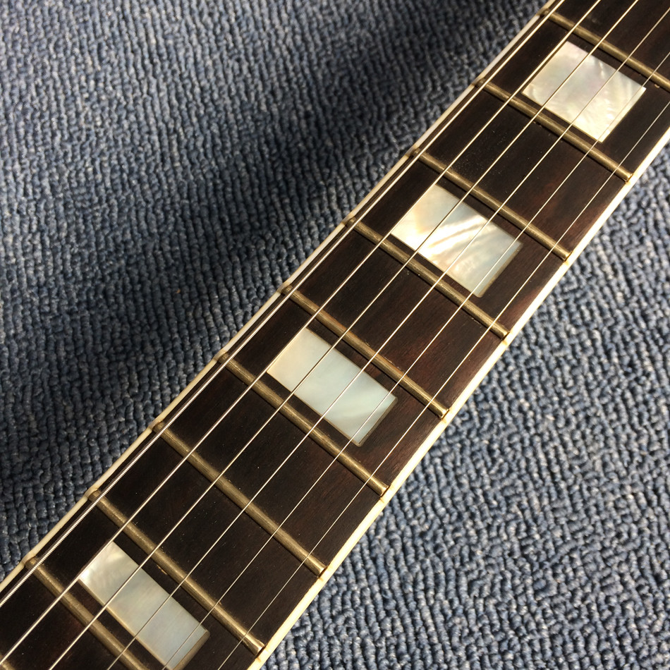 Hollow body jazz electric guitar, Double F holes,Ebony Fingerboard,Tremolo system,white guitar