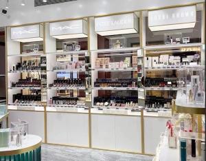 Wholesale Golden Luxury Cosmetic Display Cabinet 4 Layers With Acctrative Advertising Light Box Cosmetic Display Stand from china suppliers