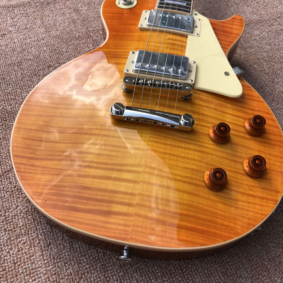 One piece of body & neck LP electric guitar Yellow tiger top adjusting the adjacent Matic bridge