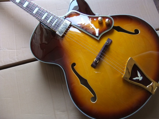Wholesale New Rare Jazz Electric Guitar L-5 Model With Flower Pickuguard and Tailpiece and Headstock In Sunburst