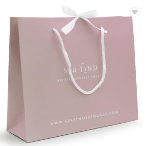 Wholesale Biodegradable Spot UV Printed Paper Shopping Bags from china suppliers